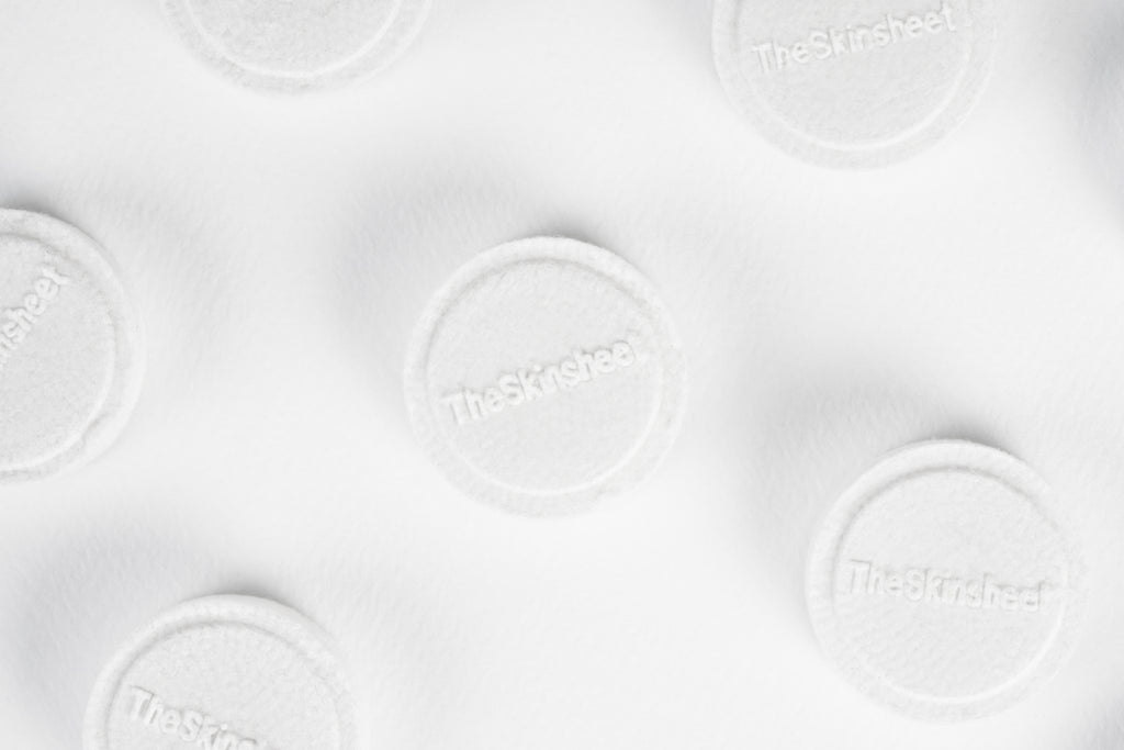 The Skinsheet Cleansing Coins, 1-inch coins morph into 10 x 10-inch cloths when moist​​​​​​​​.